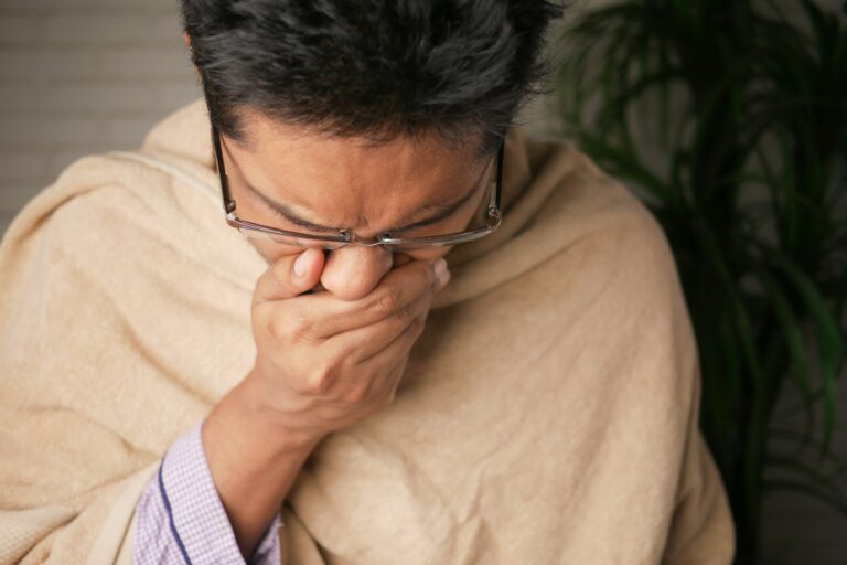 Sick elderly coughing